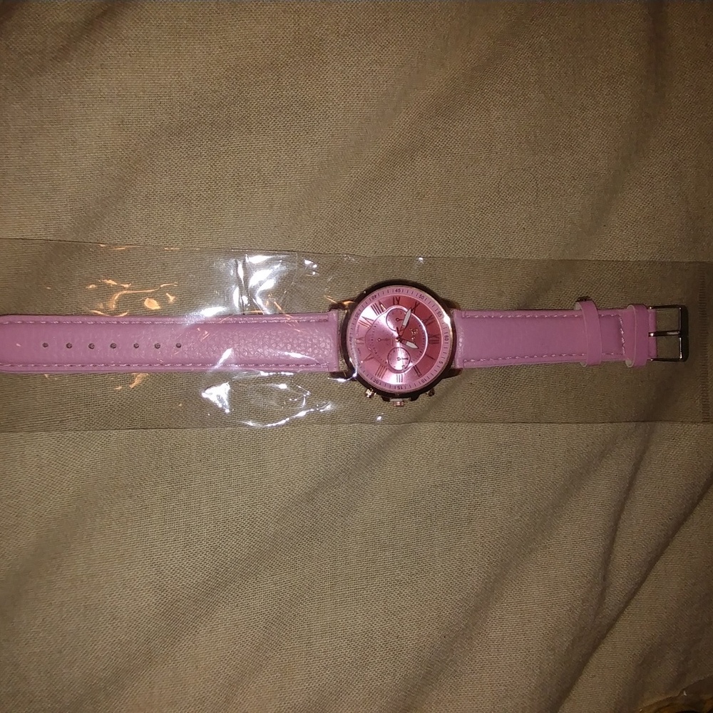 Pink faced watch